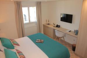 Hotels Cit'Hotel Le Cornouaille Hotel : photos des chambres