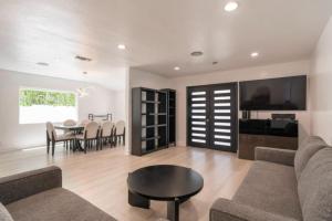 Modern Encino Retreat with pool, lush yard and comfort