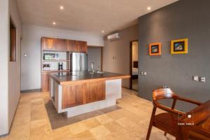 Spectacular House with a Private Beach Front