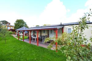 Cottage by Ostrowieckie Lake with Private Beach