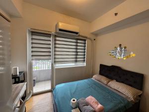 Grace Residences 1 Br Fast Wi-Fi Near BGC and Mckinley