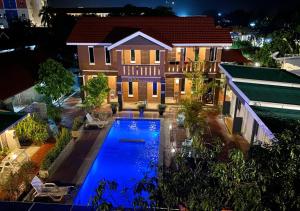 D'Lima Beach Inn - Ubytování bez kategorie ve městě Pantai Cenang