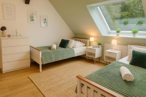 4 Schlafzimmer,2 Bäder, vollausgestatte Küche,Parkplatz,Wlan