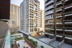 Modern 1BR in JVC Pool, Gym & Free Parking