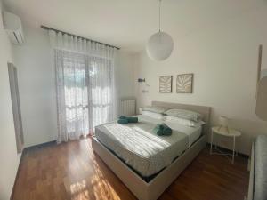 Sunset Escape, relax a due passi dal mare con terrazza e aria condizionata