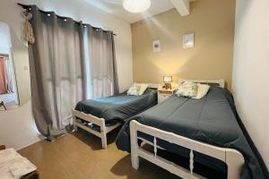 HOSPEDAJE " Doña Ana" a 15 minutos del Aeropuerto Internacional de Ezeiza con Parking Gratis