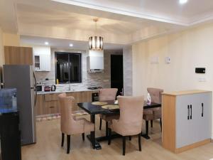 serene stays apartment with fully equipped gym , heated swimming pool ,private parking space and amazing scenic views