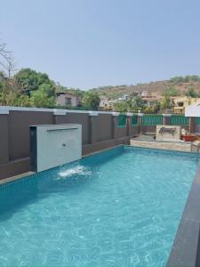 Dolally Pool,Jacuzzi and bar by Villagram,