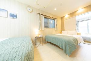 4 minutes by train to Namba 9 min walk to Sta