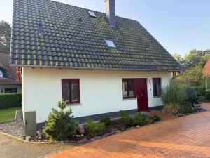 Haus Leuchtturmblick Dünenresidenz-Glowe - 4hvězdičkové hotely ve městě Glowe