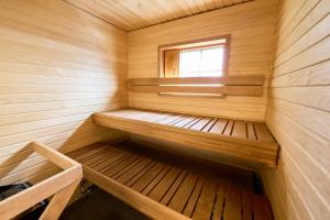 Rukan Havu - Ski-in cabin with sauna & fireplace, 100m to slopes