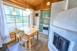 Rukan Havu - Ski-in cabin with sauna & fireplace, 100m to slopes