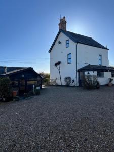 Goleufryn Abersoch has the main house and 2 barns