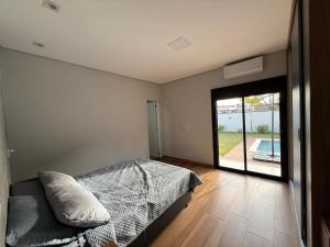 Casa Térrea com Piscina em um Resort Completo