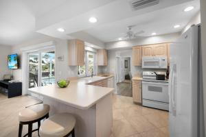 Idyllic waterfront home with pool and western exposure