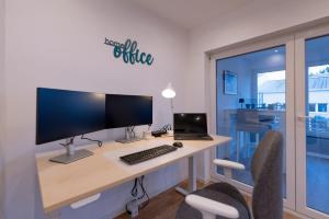 Serviced-Apartment mit Büro-Setup