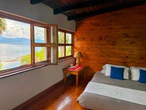 Lakefront Villa with Beach Access & Infinity Pool