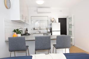 Beachfront self contained upstairs apartment