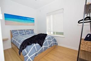 Beachfront self contained upstairs apartment