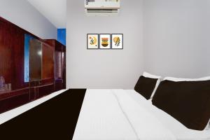 Hotel O Alappuzha Near General Hospital Junction