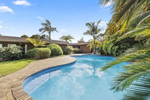 Poolside Palms Oasis