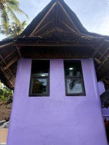 Purple Beach House for Two Guests