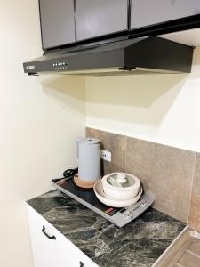 CoZerenity Stays Minimalist Condo in Naga City