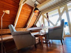 Pfahlbau Sunset II Toplage inklusive Elektroboot