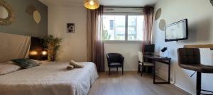 Le KOZY - Climatisation - Parking Gratuit