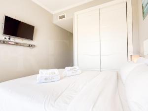 Apartment with terrace, pool and padel access REMS