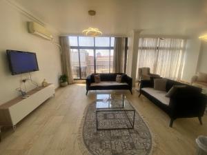 Luxurious apartment in dokki partial Nile view