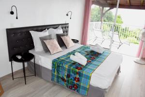 Duplex Rose Porcelaine - Vue Mer- Malendure - 3hvězdičkové hotely ve městě Bouillante