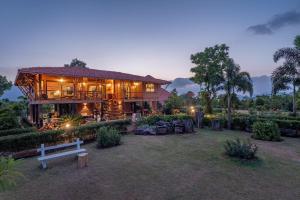 SaffronStays Satori WoodHouse - 2BR lake-view pool villa with farm-to-table dining, machan sit-out and lush gardens
