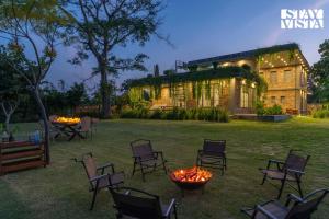 StayVista at The Tilah with Pool, Lawn, WiFi