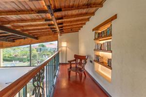 SaffronStays Satori Hornbill - Tuscan 2BR lake-view villa with pool, bar, verandahs & farm-to-table dining