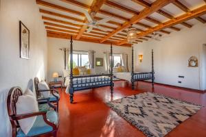 SaffronStays Satori Hornbill - Tuscan 2BR lake-view villa with pool, bar, verandahs & farm-to-table dining