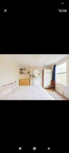 Victorian house in front of a park