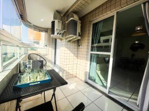 Onda76 Ap temporada Praia Grande Beira Mar churrasqueira carvão