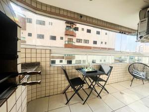 Onda76 Ap temporada Praia Grande Beira Mar churrasqueira carvão