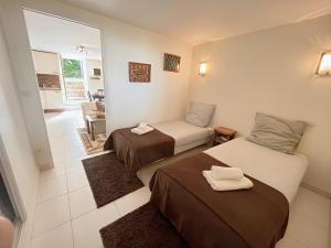 À 2 pas de la plage, Parking privé et gratuit