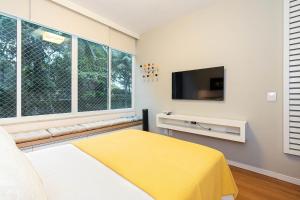 Loft Charmoso com Ar-Condicionado, SmartTv, Wi-Fi em Condomínio frente mar