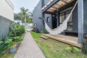 Studio Aquarela perto da praia by Achei