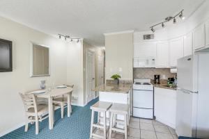 Steps to Galveston Beach Corner-Unit Condo!