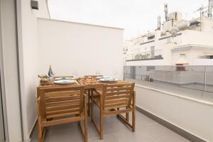 Beach View Flat w Balcony near Casino by HostWise