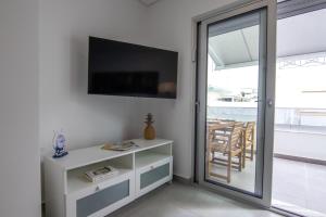 Beach View Flat w Balcony near Casino by HostWise