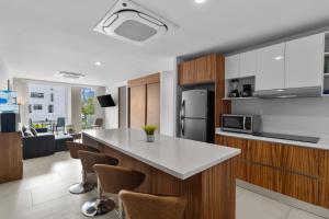 Comfort and design in a green oasis near the beach