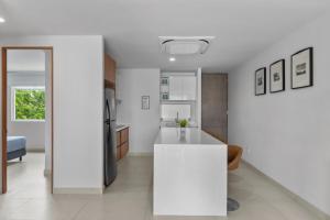 Comfort and design in a green oasis near the beach