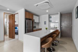 Comfort and design in a green oasis near the beach