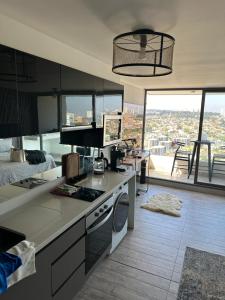 Bonito estudio en el piso 29