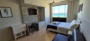 Loft Prainha AP 207 frente mar, check in 9h-check out 13h, split, piscina, self check in, portaria 24h